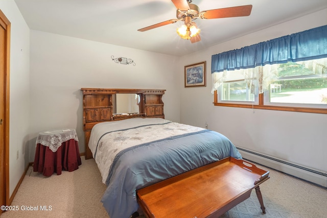 921 Altamont Voorheesville Rd, Altamont, NY 12009 - carpeted bedroom featuring baseboard heating and ceiling fan