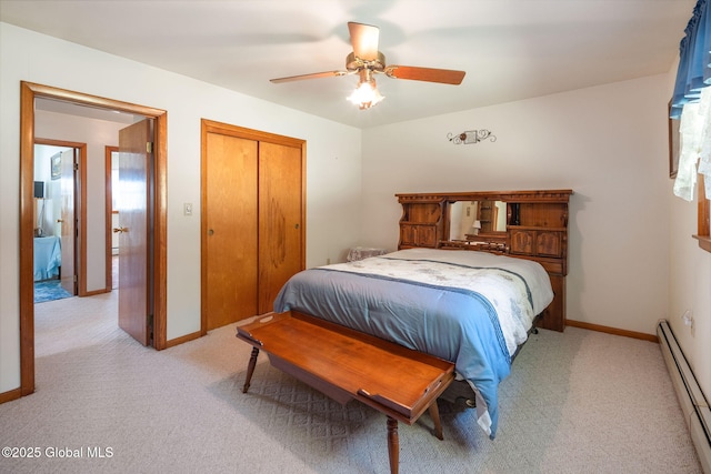 921 Altamont Voorheesville Rd, Altamont, NY 12009 - bedroom with a baseboard heating unit, light colored carpet, a closet, and ceiling fan