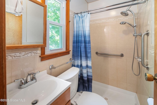 921 Altamont Voorheesville Rd, Altamont, NY 12009 - bathroom featuring plenty of natural light, a tile shower, vanity, tile walls, and decorative backsplash