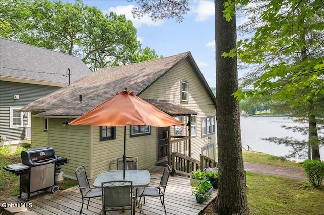 2235 Oaks Rd, Argyle, NY 12809 - wooden deck featuring a grill, outdoor dining space, and a water view