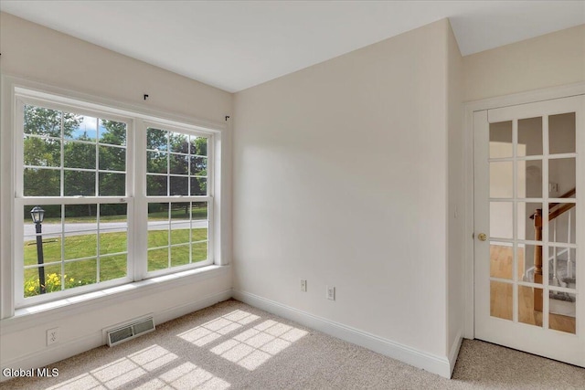 3 Lucille Ln, Malta, NY 12019 - unfurnished room featuring baseboards and light carpet