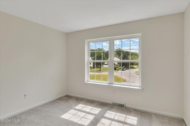 3 Lucille Ln, Malta, NY 12019 - empty room featuring healthy amount of natural light and carpet