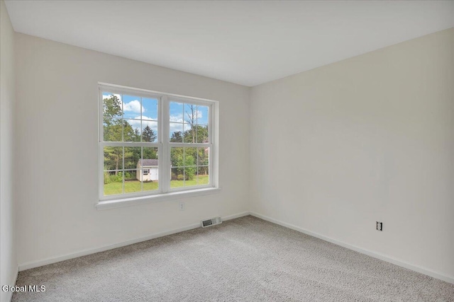 3 Lucille Ln, Malta, NY 12019 - spare room with carpet floors and baseboards