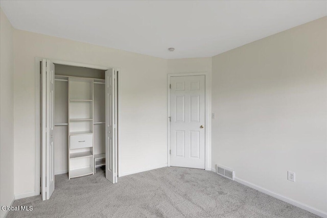 3 Lucille Ln, Malta, NY 12019 - unfurnished bedroom featuring carpet flooring and a closet