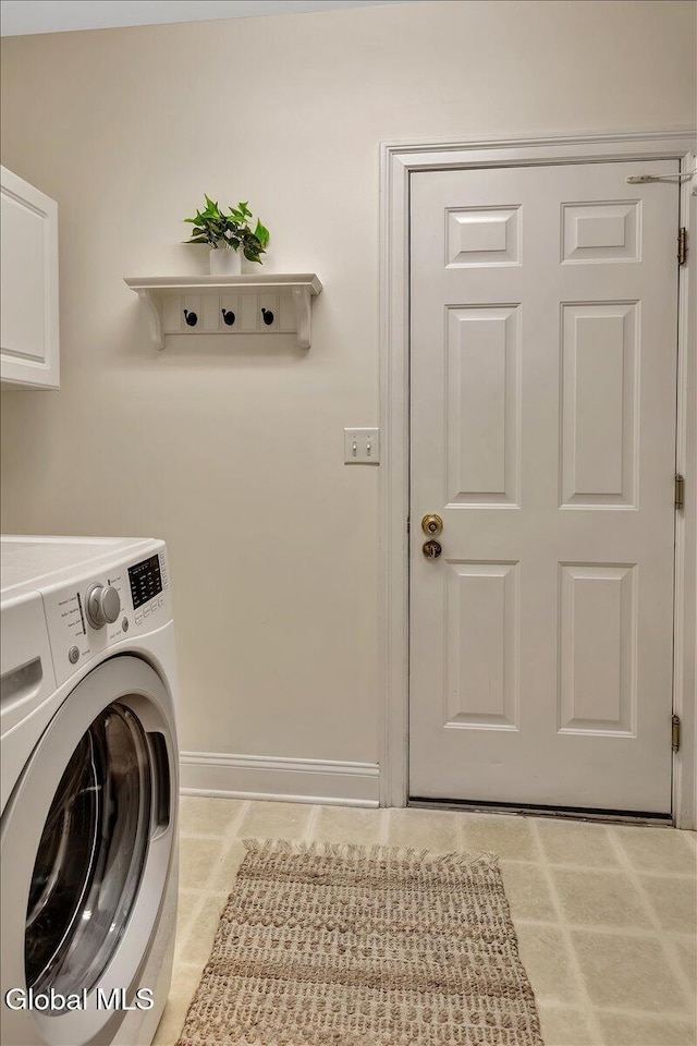 3 Lucille Ln, Malta, NY 12019 - laundry room featuring washer / dryer and cabinet space