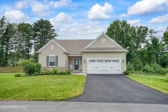 55 Winterberry Ln, Moreau, NY 12828 - view of front facade featuring a garage, driveway, and a front yard