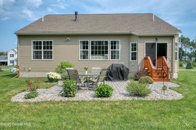 55 Winterberry Ln, Moreau, NY 12828 - rear view of property featuring a patio area, a lawn, and entry steps