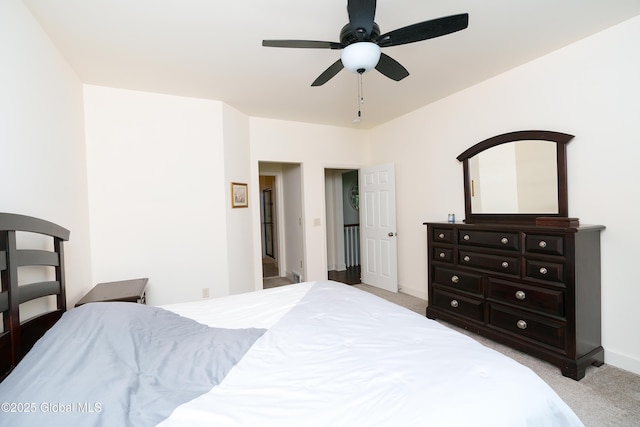 55 Winterberry Ln, Moreau, NY 12828 - bedroom with light carpet and a ceiling fan