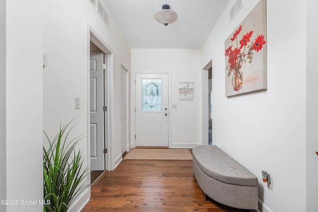 55 Winterberry Ln, Moreau, NY 12828 - doorway to outside with hardwood / wood-style floors and baseboards