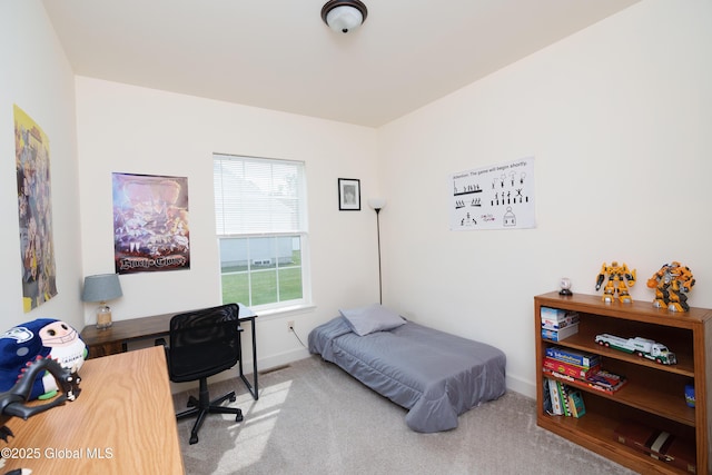 55 Winterberry Ln, Moreau, NY 12828 - carpeted bedroom featuring baseboards and a desk
