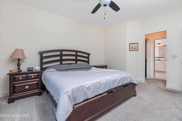 55 Winterberry Ln, Moreau, NY 12828 - bedroom featuring light colored carpet, a ceiling fan, and ensuite bath