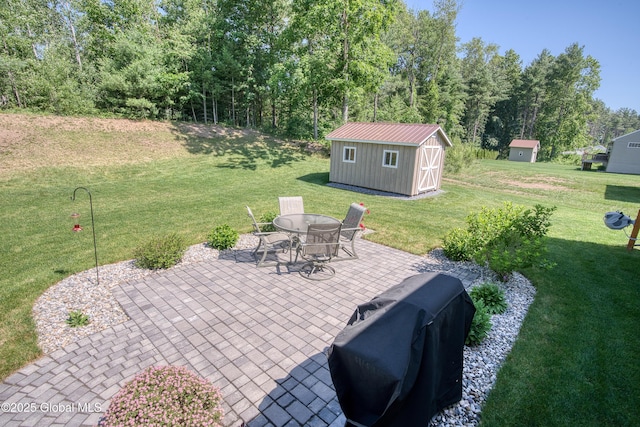 55 Winterberry Ln, Moreau, NY 12828 - view of patio with a storage shed, outdoor dining area, and a grill
