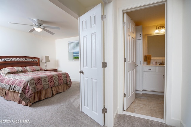 55 Winterberry Ln, Moreau, NY 12828 - bedroom with light carpet, ensuite bathroom, and a ceiling fan