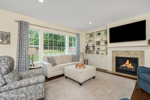 55 Winterberry Ln, Moreau, NY 12828 - living area featuring wood finished floors, recessed lighting, and a high end fireplace