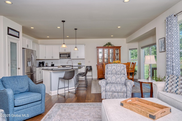 55 Winterberry Ln, Moreau, NY 12828 - living room with dark wood-style floors and recessed lighting