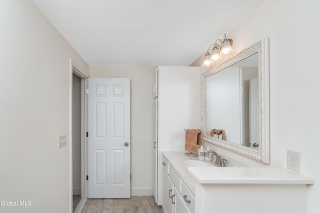 55 Winterberry Ln, Moreau, NY 12828 - bathroom with vanity and baseboards