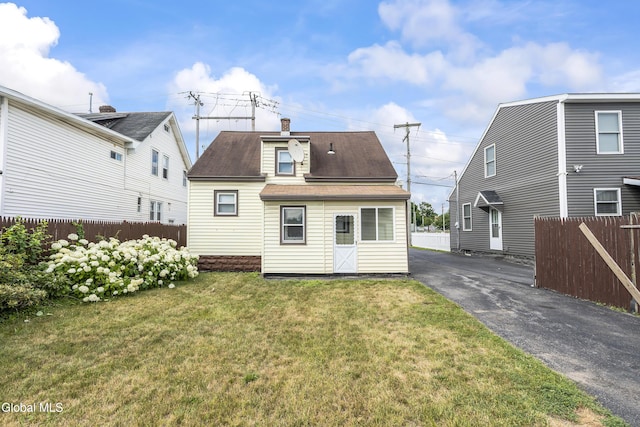 1633 Chrisler Ave, Schenectady, NY 12303 - back of property featuring a shingled roof and a chimney