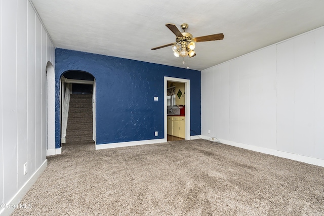 1633 Chrisler Ave, Schenectady, NY 12303 - carpeted spare room featuring arched walkways and a ceiling fan