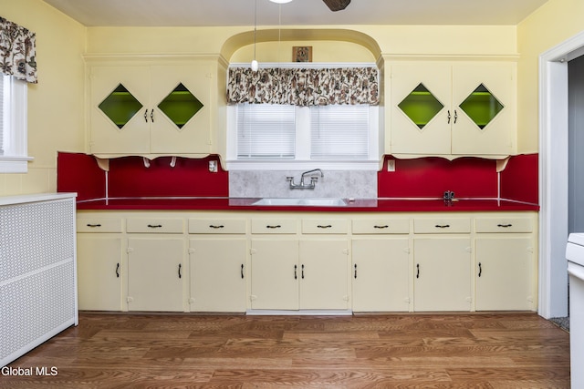 1633 Chrisler Ave, Schenectady, NY 12303 - kitchen with wood finished floors, plenty of natural light, and white cabinetry