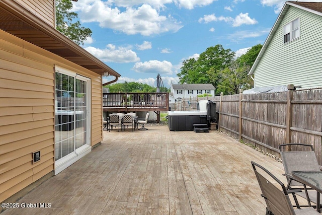 15 Deer Path Dr, Colonie, NY 12205 - wooden deck featuring a hot tub and outdoor dining space