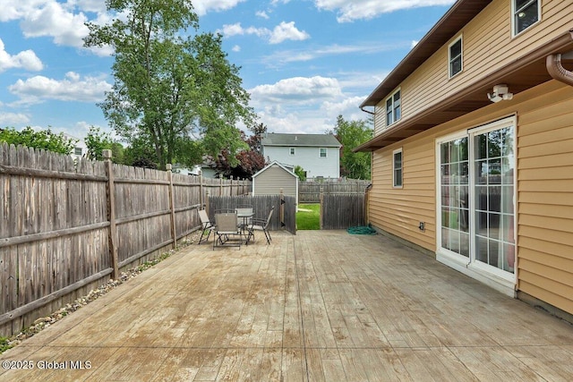 15 Deer Path Dr, Colonie, NY 12205 - wooden deck with outdoor dining space and a fenced backyard