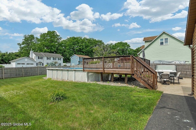 15 Deer Path Dr, Colonie, NY 12205 - fenced backyard featuring a deck and a patio area