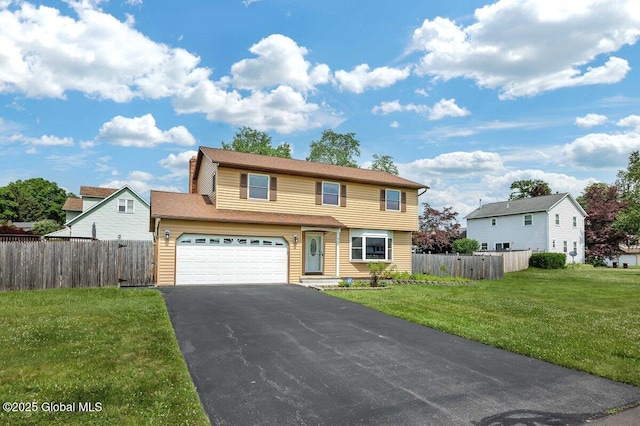 15 Deer Path Dr, Colonie, NY 12205 - view of front of property featuring driveway, a chimney, and an attached garage