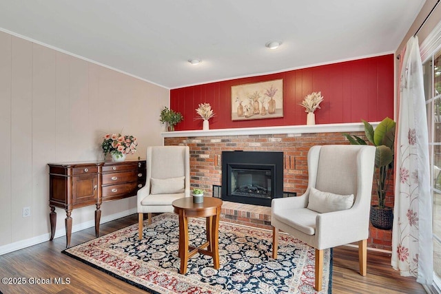 15 Deer Path Dr, Colonie, NY 12205 - living area with wood finished floors, crown molding, and a fireplace