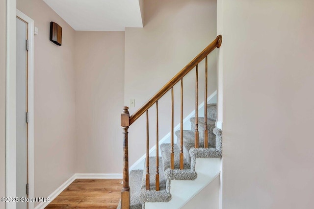 15 Deer Path Dr, Colonie, NY 12205 - staircase with wood finished floors and baseboards