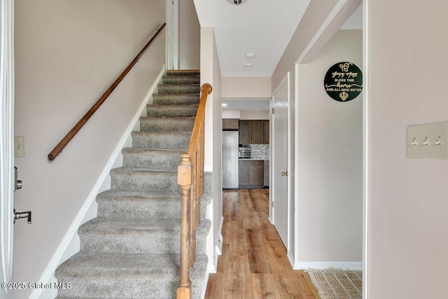 15 Deer Path Dr, Colonie, NY 12205 - stairs featuring wood finished floors and baseboards