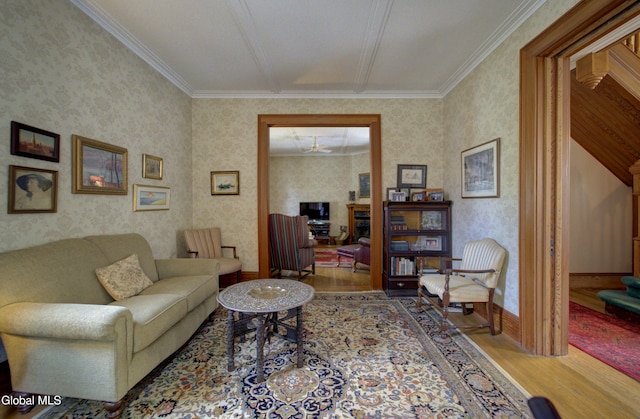 202 W 1st Ave, Johnstown, NY 12095 - living area with wood finished floors, ornamental molding, and wallpapered walls