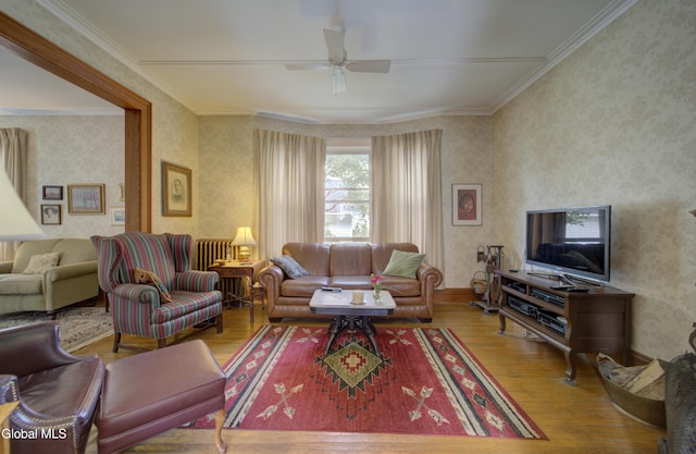 202 W 1st Ave, Johnstown, NY 12095 - living room with wood finished floors, ceiling fan, wallpapered walls, and crown molding