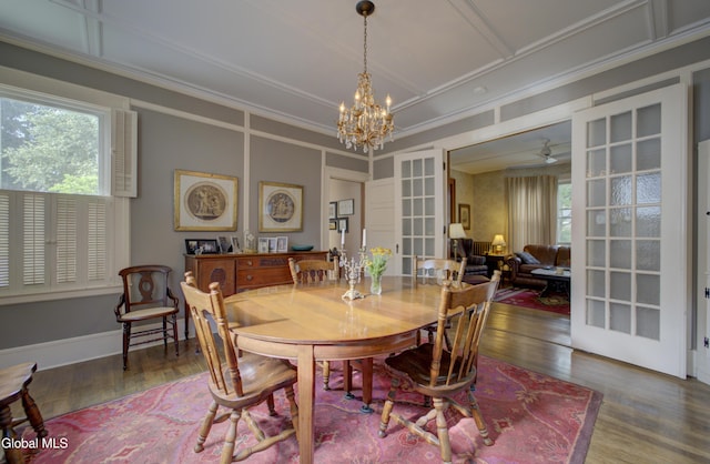202 W 1st Ave, Johnstown, NY 12095 - dining space with wood finished floors, a chandelier, and crown molding