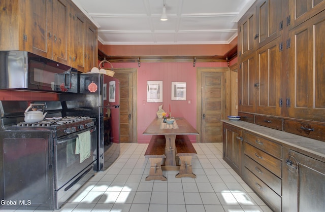 202 W 1st Ave, Johnstown, NY 12095 - kitchen with black appliances, light tile patterned floors, ornamental molding, and brown cabinets