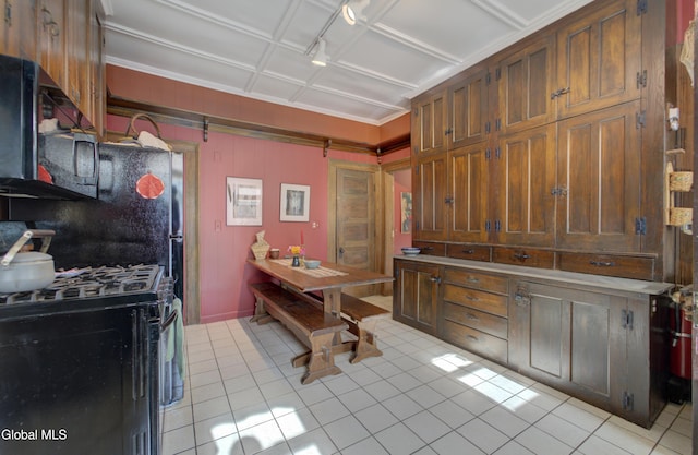 202 W 1st Ave, Johnstown, NY 12095 - kitchen with black appliances and light tile patterned floors