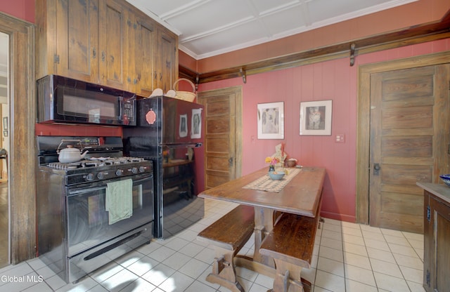 202 W 1st Ave, Johnstown, NY 12095 - kitchen with black appliances, light tile patterned flooring, and ornamental molding
