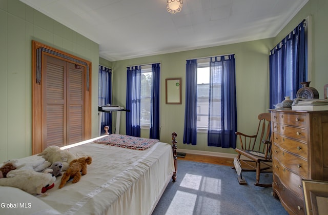 202 W 1st Ave, Johnstown, NY 12095 - bedroom with crown molding and carpet flooring