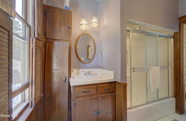 202 W 1st Ave, Johnstown, NY 12095 - bathroom featuring vanity and combined bath / shower with glass door