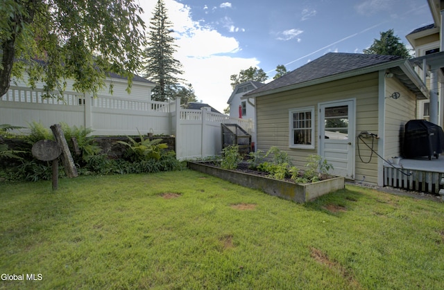 202 W 1st Ave, Johnstown, NY 12095 - view of yard featuring a vegetable garden