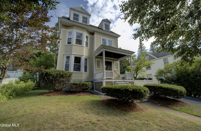 202 W 1st Ave, Johnstown, NY 12095 - view of front of property featuring a front lawn and covered porch
