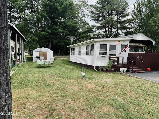 783 Woodstock Rd Lot 35, Berne, NY 12059 - view of green lawn featuring a shed and view of wooded area