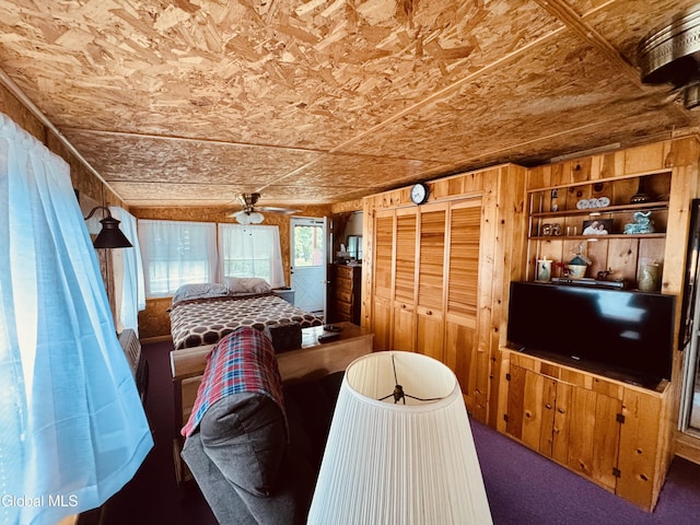 783 Woodstock Rd Lot 35, Berne, NY 12059 - living area featuring wooden walls, ceiling fan, carpet, and an ornate ceiling