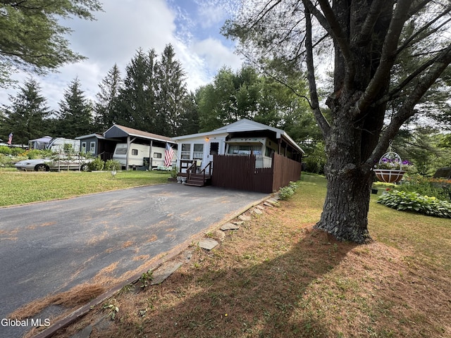 783 Woodstock Rd Lot 35, Berne, NY 12059 - view of front facade with a front lawn and driveway