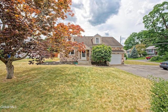 2834 Halsey Dr, Schenectady, NY 12304 - cape cod house with stone siding, driveway, an attached garage, and a front yard
