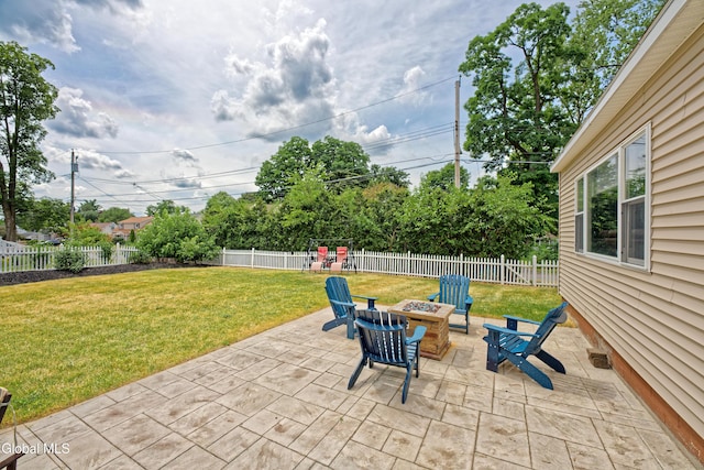 2834 Halsey Dr, Schenectady, NY 12304 - fenced backyard with a patio area and a fire pit