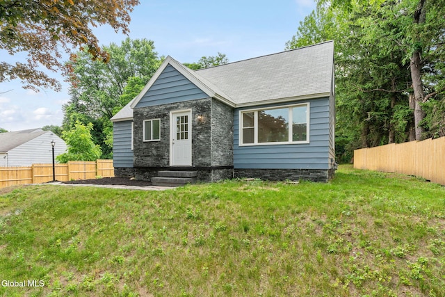 479 Albany Shaker Rd, Colonie, NY 12211 - view of front of house with entry steps, a shingled roof, and stone siding
