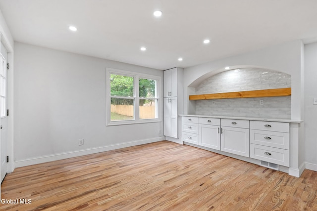 479 Albany Shaker Rd, Colonie, NY 12211 - kitchen featuring white cabinetry, light wood finished floors, open shelves, recessed lighting, and light countertops