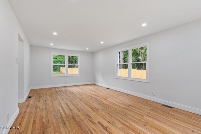 479 Albany Shaker Rd, Colonie, NY 12211 - empty room with plenty of natural light, light wood finished floors, and recessed lighting