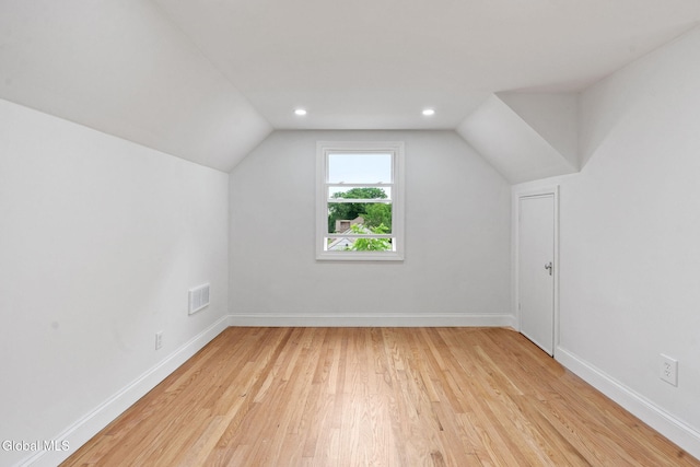 479 Albany Shaker Rd, Colonie, NY 12211 - additional living space with light wood-type flooring, vaulted ceiling, and recessed lighting