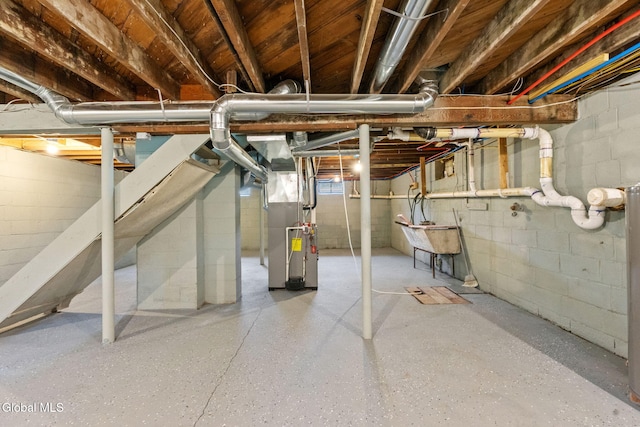 479 Albany Shaker Rd, Colonie, NY 12211 - unfinished basement featuring concrete block wall and heating unit